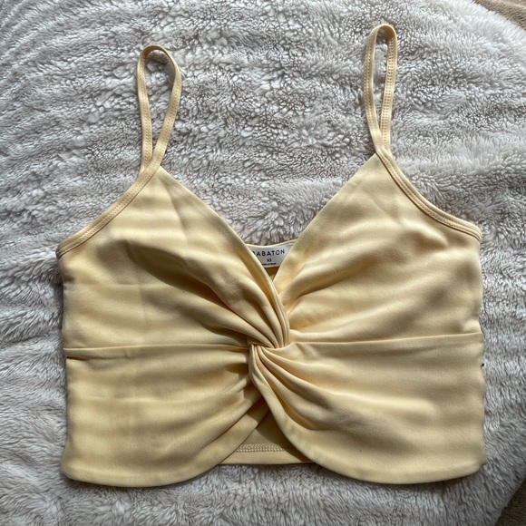 Babaton Tops - Babaton pastel yellow twist crop top